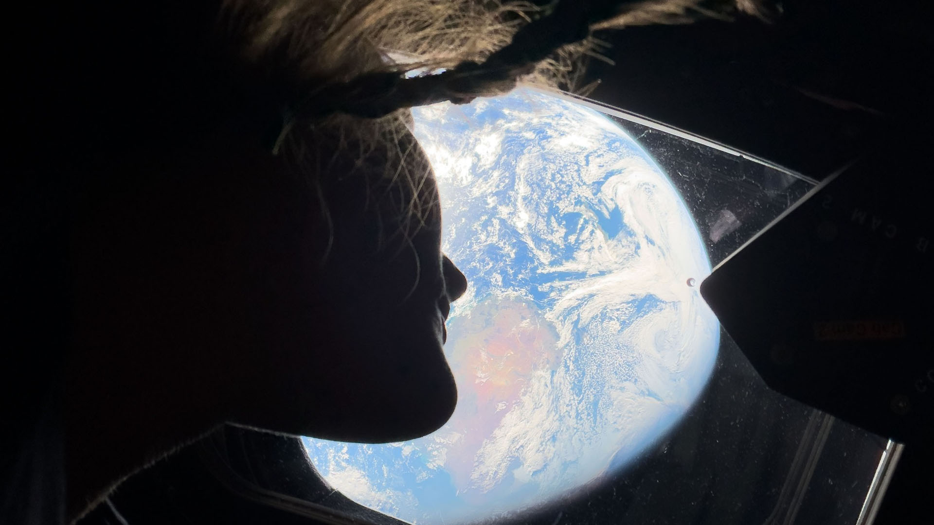 Artemis crew reaches moon, approaches record distance from Earth