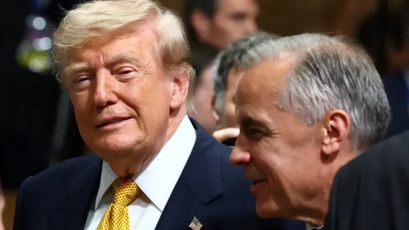 Trump slaps 50% tariffs on Canada and Carney vows to ‘intensify’ trade talks